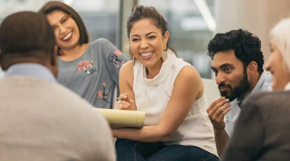 Diverse team in a workplace wellbeing session